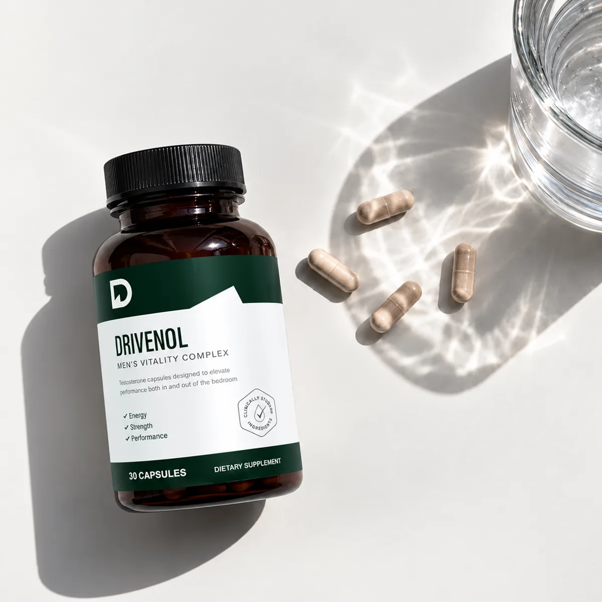 Drivenol bottle beside loose capsules and a glass of water